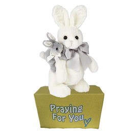 White and gray bunny rabbits stuffed animal standing on a yellow box ready to be sent as a care package. send a PRAYER : sendaprayernow.com